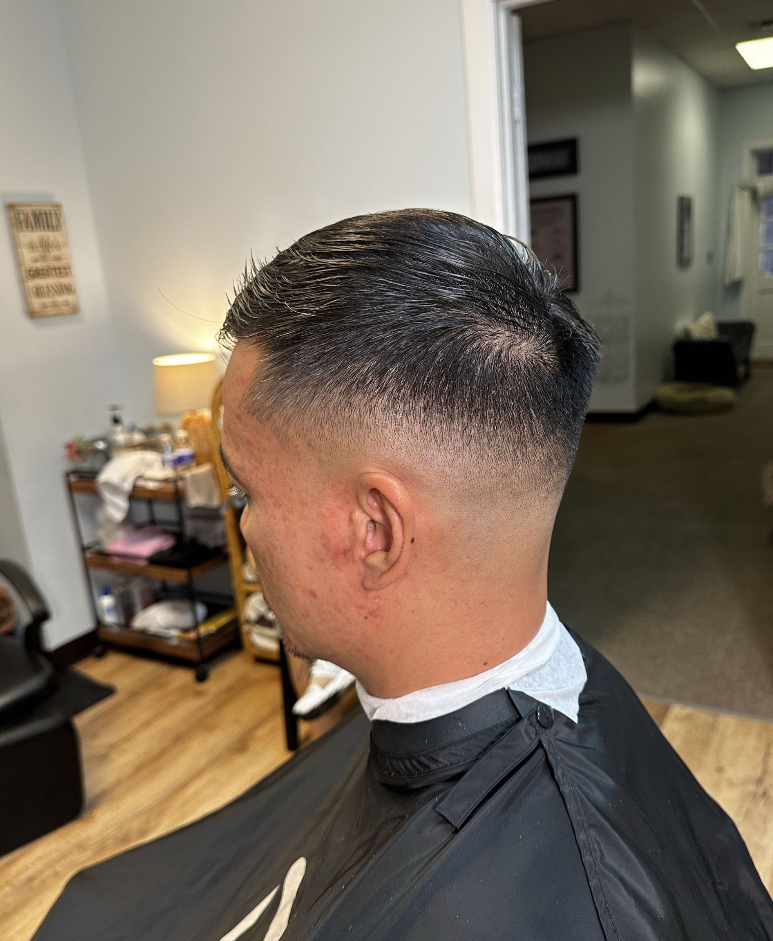 Slick back with high skin fade