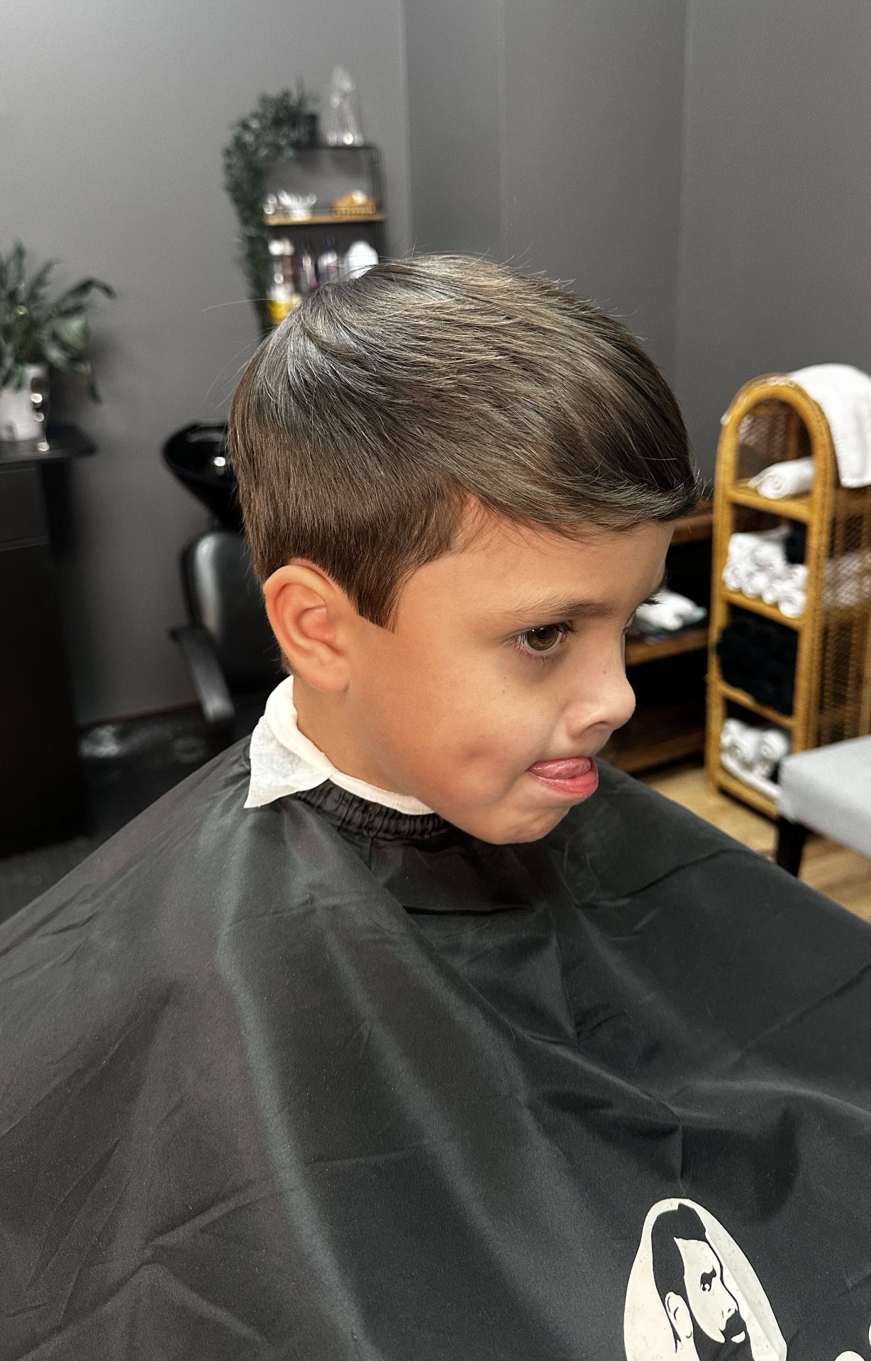Kids side-swept cut with clean taper