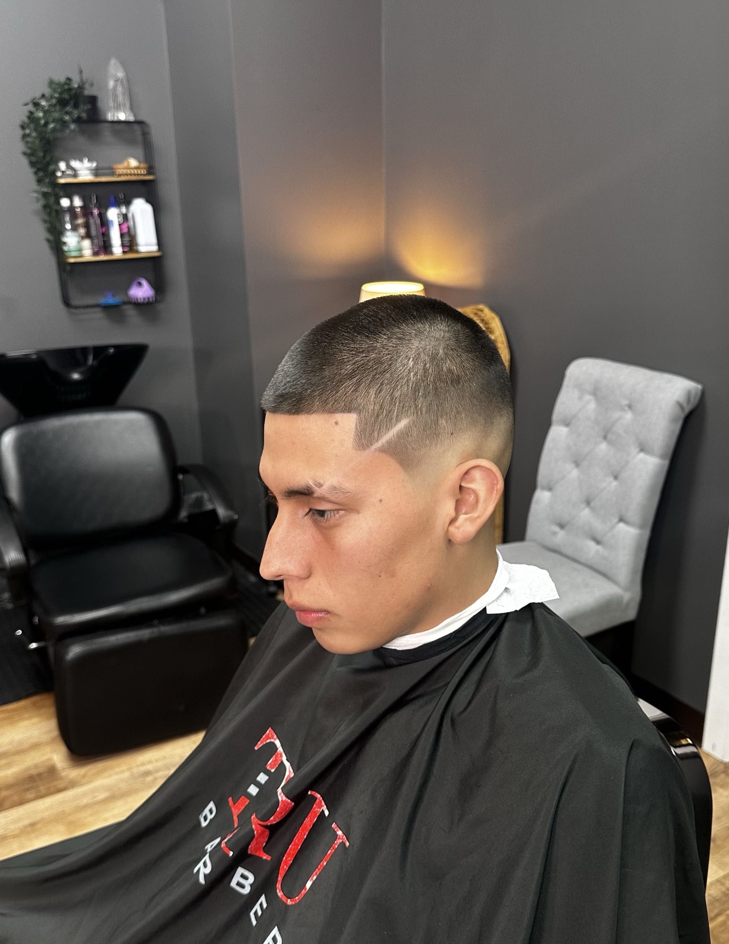Buzz cut with hard part detail