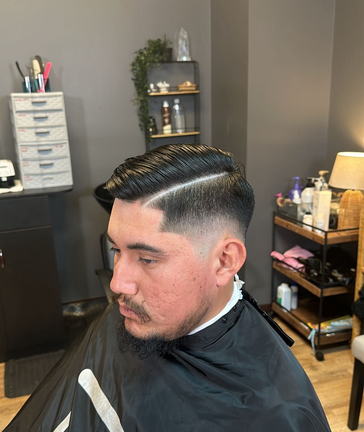 Sharp side part with mid drop fade